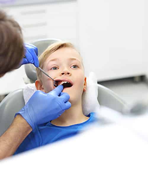Child At The Dentist — Pain Free Dental Clinic In Moss Vale, NSW