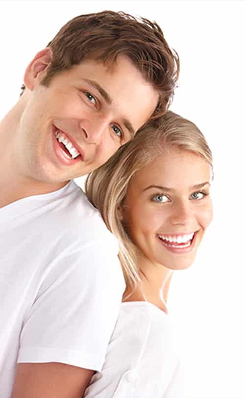 Happy Smiling Couple — Pain Free Dental Clinic In Moss Vale, NSW